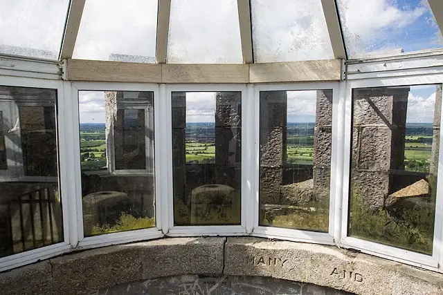 Round stone tower with crenellated top standing on the Hill of Allen in County Kildare.